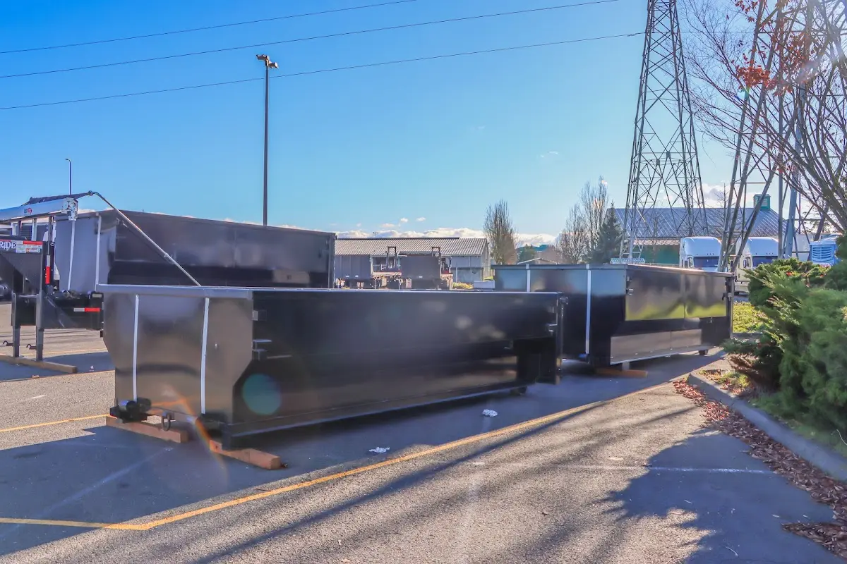 Roll-off dumpster ready for waste disposal at job site for 40 Yard Dumpster Rental in Forest Hill